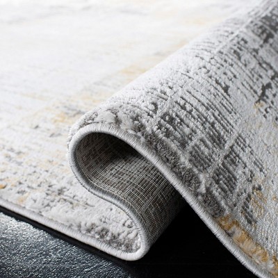 Grey and Beige Abstract Synthetic Area Rug 4' x 6'