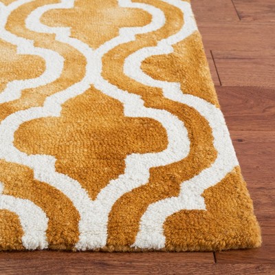 Ivory and Gold Hand-Tufted Wool 6' x 9' Rectangular Rug