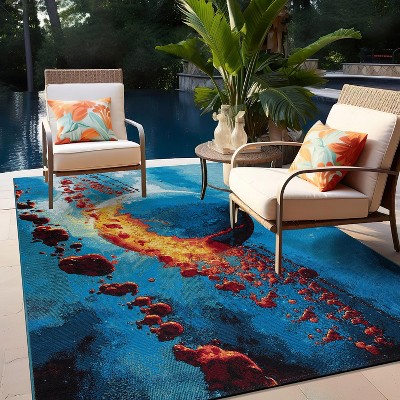 Galactic Wonder Blue and Red Synthetic Area Rug 5' x 7'
