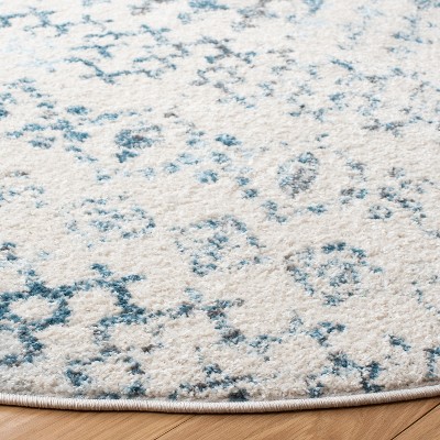Ivory and Turquoise Geometric Hand-knotted Round Wool Rug