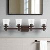 Sunset Lighting Riella 4-Light Vanity in Provincial Bronze,  Clear Seeded Glass - 3 of 4