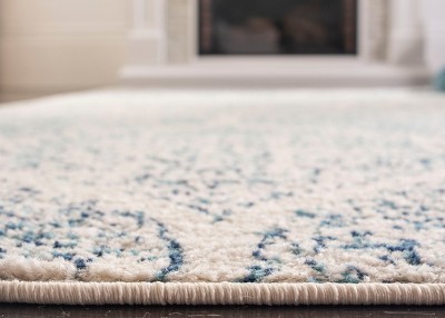 Elegant Cream & Turquoise Synthetic 8'x10' Reversible Area Rug