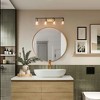 LNC Alumbrar Polished Gold and Matte Black Bathroom Vanity Light with Clear Glass Cone Shades, Modern, 3-Light, 4-Light - 4 of 4