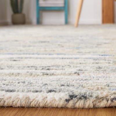 Ivory and Natural Floral Hand-Tufted Wool Area Rug