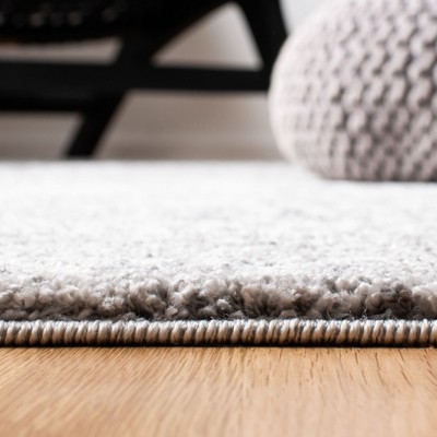 Tunisia Black and Ivory Geometric Hand-knotted Area Rug