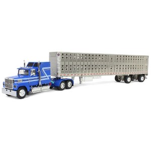 First Gear 1/64 Blue Ford LTL 9000 60in Aerodyne Sleeper & Wilson Livestock Trailer 60-1769 - 1 of 4