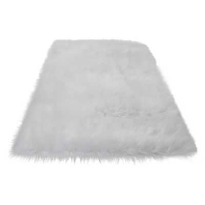 HomeRoots 5' X 7' White Faux Sheepskin Shag Washable Area Rug