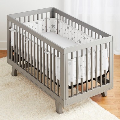 grey and white cot bumper