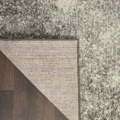 Charcoal Ivory Abstract Synthetic 45x69 Medium Area Rug