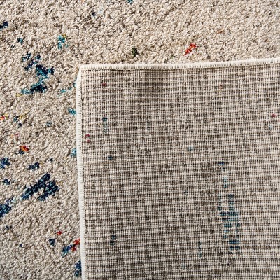 Ivory and Blue Reversible Synthetic 8' x 10' Rug