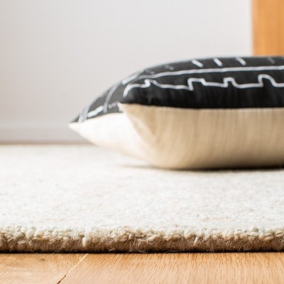 Elegant Ivory Wool 4' x 6' Hand-Tufted Rectangular Area Rug