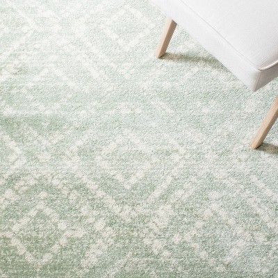 Adirondack Green and Ivory Geometric 6' x 9' Synthetic Rug