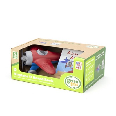 green toys airplane and board book