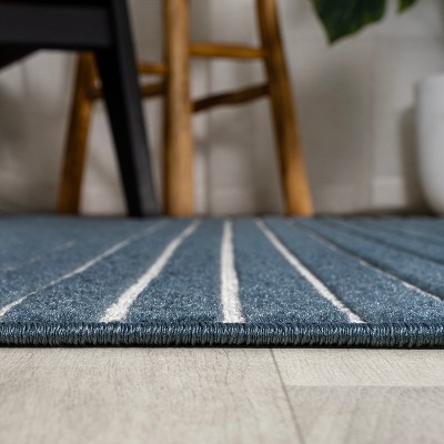 Ivory and Navy Striped Synthetic 4' x 6' Reversible Rug