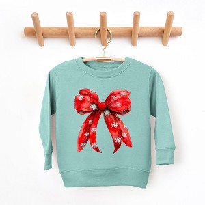 The Juniper Shop Coquette Christmas Snowflake Bow Youth Ultra-Soft Graphic Sweatshirt - 1 of 3