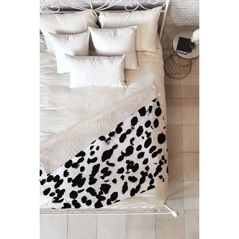 Black and white online cow print throw blanket