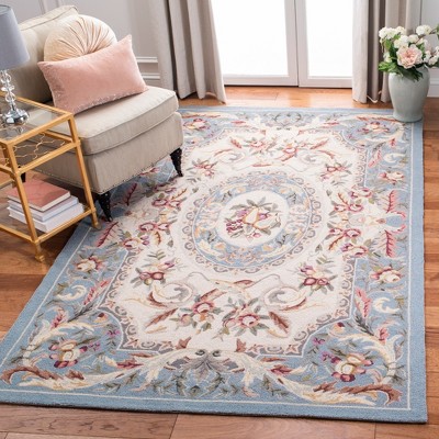 Blue Floral Hand-Hooked Wool Area Rug 5'3" x 8'3"