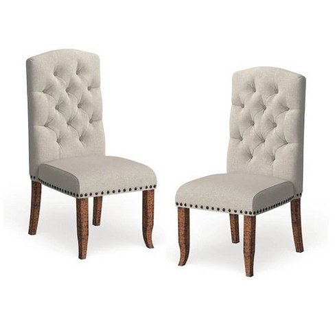 Ivory tufted deals dining chairs