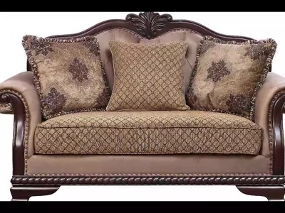 Beige Tufted Fabric Loveseat with Floral Pillows and Nailhead Trim