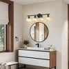 DORESshop 26 in. 4-Light Bathroom Vanity Light Fixtures Over Mirror, Black Bathroom Light Fixtures with Clear Globe Glass Shades - 3 of 4