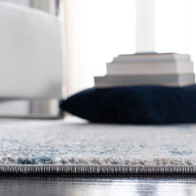 Boho-Chic Ivory/Blue Synthetic 9' x 12' Reversible Area Rug