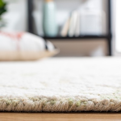 Ivory Floral Hand-Tufted Wool 4' x 6' Area Rug
