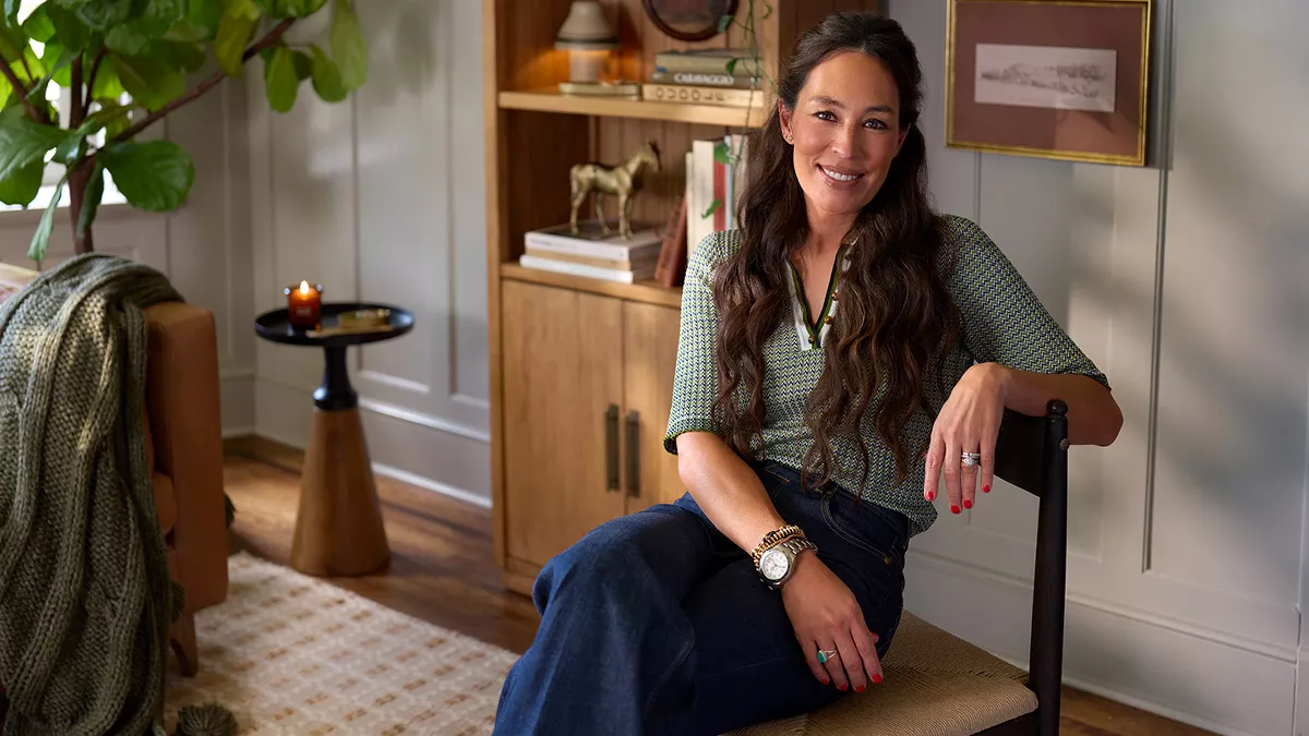 Joanna Gaines sitting in cozy atmosphere
Autumnal set dining table
