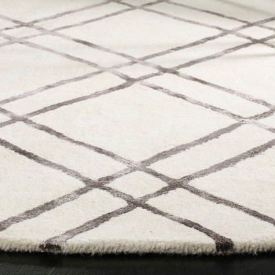 Hand-Tufted Artisan Square Wool Rug in Rich Brown