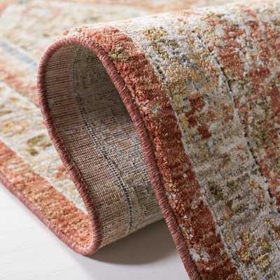Rust and Blue Hand-Knotted Synthetic Area Rug