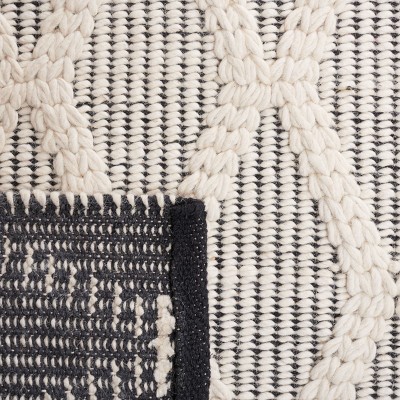 Handmade Black and Ivory Wool Diamond 6' x 9' Area Rug