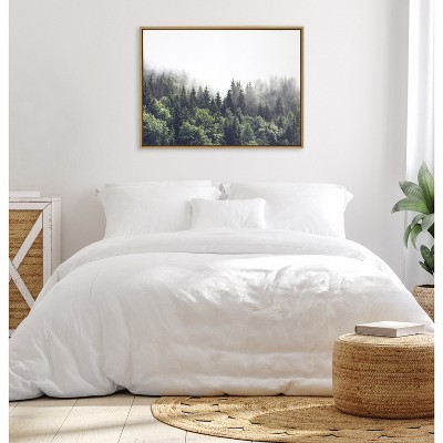 Lush Green Forest on a Foggy Day Canvas Print with Natural Frame
