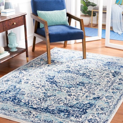 Ivory and Blue 8' x 10' Synthetic Square Area Rug