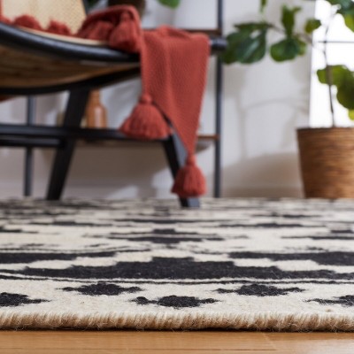 Black and Ivory Geometric Wool 8' x 10' Flat Woven Rug