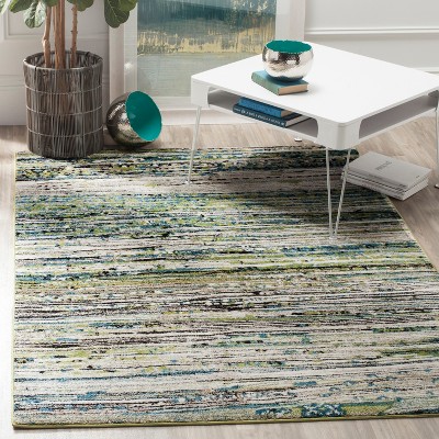 Elysian Blooms Cream/Green Synthetic 5'3" x 7'6" Area Rug