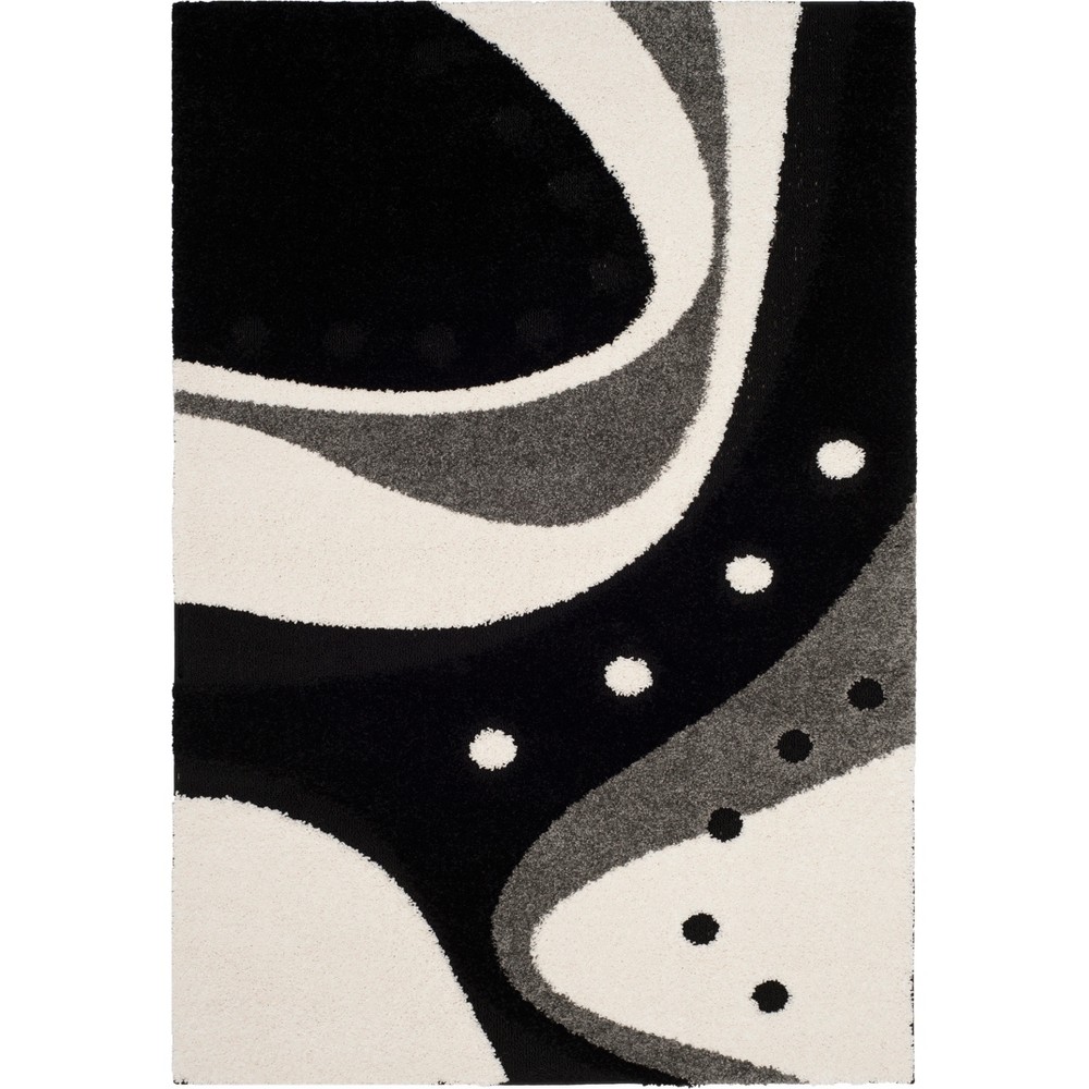 4'x6' Lessie Shapes Loomed Rug Black/Ivory - Safavieh