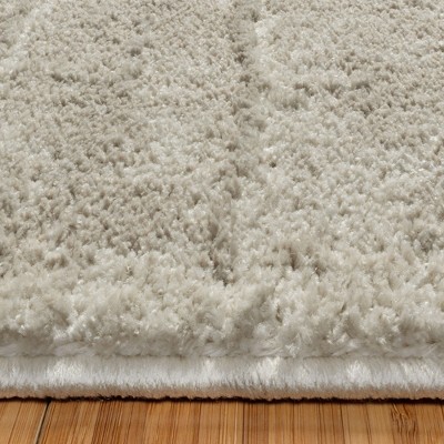 Cream Tufted Rectangular 5' x 7' Synthetic Shag Area Rug
