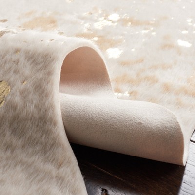 Beige and Gold Faux Cowhide 6' x 8' Area Rug