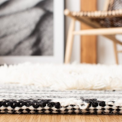 Hand-Knotted Artisan Black Wool 9' x 12' Rectangular Area Rug