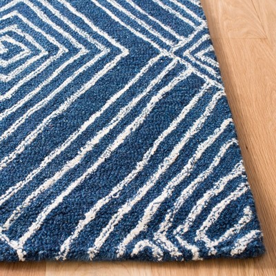 Hand-Tufted Ivory Wool 59" Round Area Rug