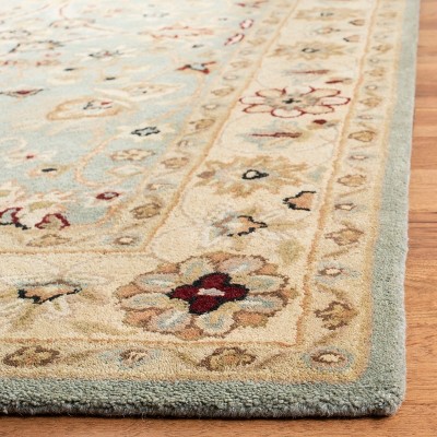 Heritage Elegance Off-White Tufted Wool Accent Rug 24" x 4"