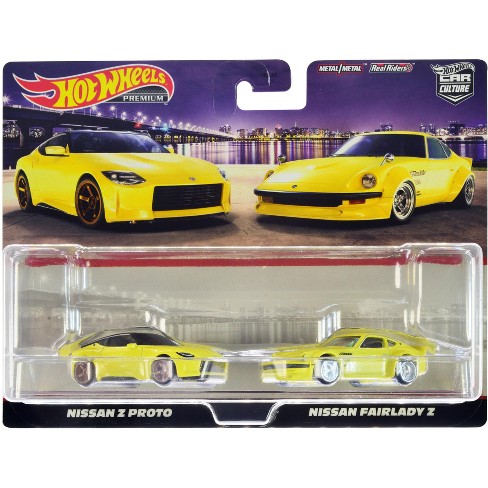 Nissan Z Proto Yellow With Black Top And Nissan Fairlady Z Yellow