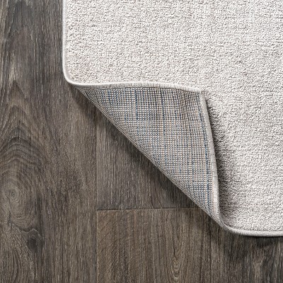 Ivory Soft Synthetic 5' Square Easy-Care Area Rug