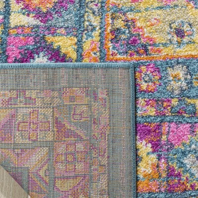 Light Blue and Orange Synthetic Easy Care Area Rug, 6' x 9'