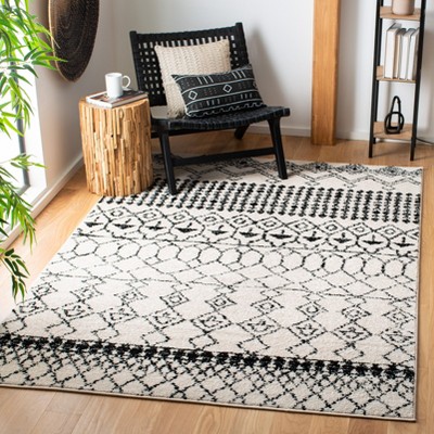 Ivory/Black Synthetic 6' x 9' Hand-Knotted Boho-Chic Area Rug