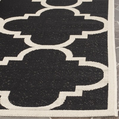 Courtyard Chic 5' x 7' Black Synthetic Easy-Care Area Rug