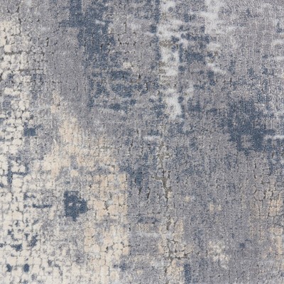 Abstract Grey and Beige Synthetic 5'3" x 7'3" Area Rug
