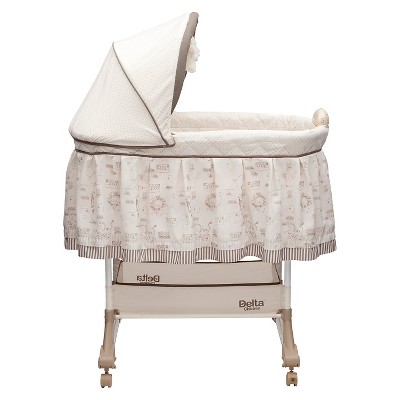 delta children's playtime jungle rocking bassinet