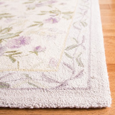 Ivory Floral Hand-Knotted Wool Oval Area Rug, 6' x 9'