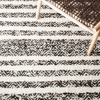 Black and Ivory Round Handwoven Wool Cotton Area Rug