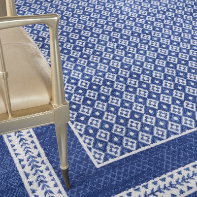Ivory Geometric 7'10" x 10' Flat Woven Synthetic Area Rug